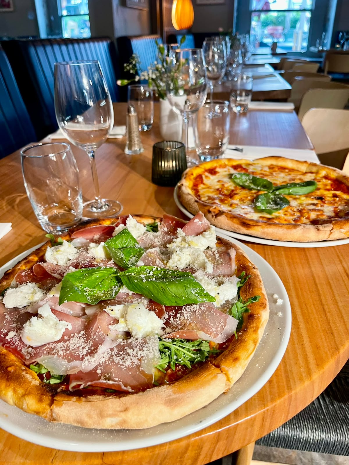 Primavera and Margherita pizzas fresh from the oven